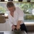 The author works the spices in a mortar.