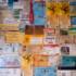A pinboard full of tickets from various past football matches in Munich.