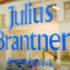 "Julius Brantner, Brothandwerk" in blue letters on the window of the bakery in Munich