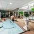 Insight into various water pools and wellness areas of a thermal spa.