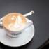 A cup of cappuccino with latte art at the Fausto coffee roastery in Munich