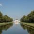 Nymphenburger canal with view to the main palace in Nymphenburg Park in Munich.