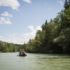 A woman and a man in a canoe on the Isar River.