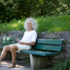 Rainer Langhans sits on a bench in the Luitpoldpark in Munich.