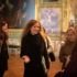 Tourists on a guided tour of the Green Gallery in the Residence Museum in Munich.