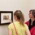 Two women looking at a painting in the Franz Marc Museum in Kochel near Munich