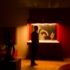 Woman standing in front of a display case in the Museum Fünf Kontinente in Munich