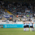 The 1860 Munich team stands in a circle on the Grünwalder Stadion pitch before the start of the match.