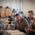 Two barrel makers inspect the material for the barrels