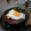 Shakshuka with egg served in a bowl
