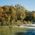 Autumnally coloured trees along the Isar river in Munich.