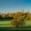 The Englischer Garten in Munich with the skyline of the inner city. 