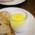 Close-up of slices of bread with sunflower seeds and a small jar of hummus in the bar BrewsLi in Munich