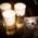 Three pale beers on a wooden counter