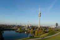 Panoramic view of the Olmpic Park with Olympic Tower, Olympic Swimming Hall, Olympic Lake and the headquarter of BMW in Munich in the background.