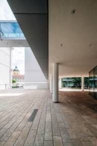 Office complex with the Theatinerkirche in the background.