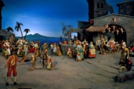 Nativity scene with figures in front of the Gulf of Naples with Vesuvius in the background.