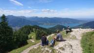 Several hikers relax at the summit.