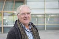 Herbert Hauke in portrait in front of the Olympic Hall.