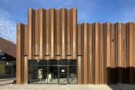 The façade of Schwere Reiter Theater in Munich made of rusty steel girders