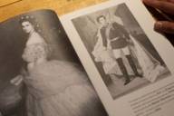 Black and white photos of Sissi and King Ludwig in a book