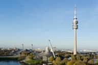 Panoramic view of the Olympic Park with the Olympic Stadium, Olympic Lake and Olympic Tower in Munich in autumn.
