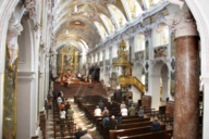 Interior view of Freising Cathedral during a mass