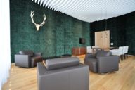 A VIP Lounge with comfortable armchairs at Munich Airport.