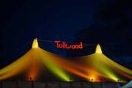 A tent at the Tollwood Festival in Munich at night.