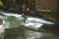 A surfer on a wave in the English Garden in Munich