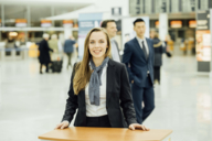 A lady welcomes new guests at Munich Airport.