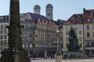 View of Max-Joseph-Platz in Munich with the Towers of the Frauenkirche in the background.