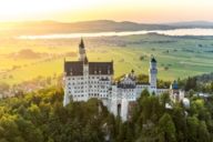 Neuschwanstein Castle in the surrounding region of Munich early in the evening.