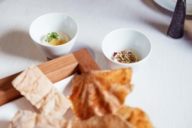 Closeup of bread and spreads at the restaurant Esszimmer in Munich.