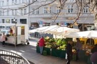 Stalls at the weekly market at Sankt-Anna-Platz in Munich.