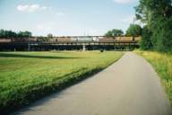 Railway bridge and street at Flaucher in Munich