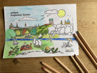 Munich painting on wooden table with crayons