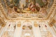 Ceiling painting and magnificent wall panelling in Nymphenburg Palace in Munich.
