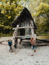 Two children are at a playground in Munich.