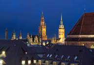 Munich city centre with the church towers and the New Town Hall in the evening.