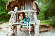 Two children are in a playground in Munich.