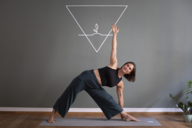 A yoga teacher demonstrates an exercise in Munich.