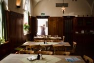 A waitress and the interior design of the restaurant Großmarkthalle in Munich.