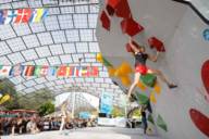 Women boulderers on the competition wall in Munich's Olympic Stadium