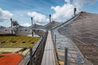 The Olympic Stadium in Munich against a blue sky