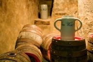 A beer mug and beer barrels in the Bier- und Oktoberfestmuseum in Munich.