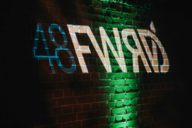 The logo of the 48forward Festival projected on a wall