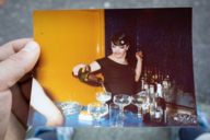 An old photograph showing the bartender of a gay bar in Munich.
