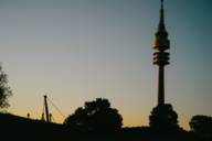 The Olympiaturm in Munich at sunset.