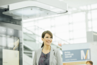 Woman in business clothes at Munich Airport